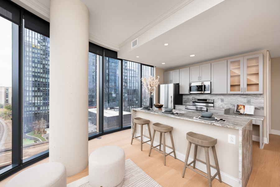 Luxury kitchen with waterfall granite countertops
