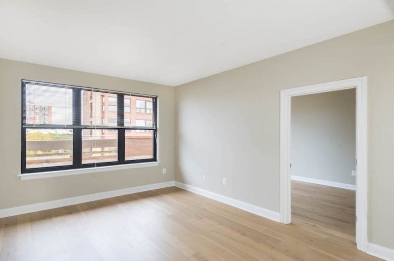 bedroom with hardwood flooring