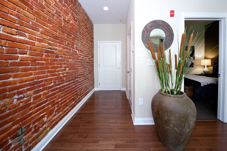 1201 N Charles unit entry with exposed brick