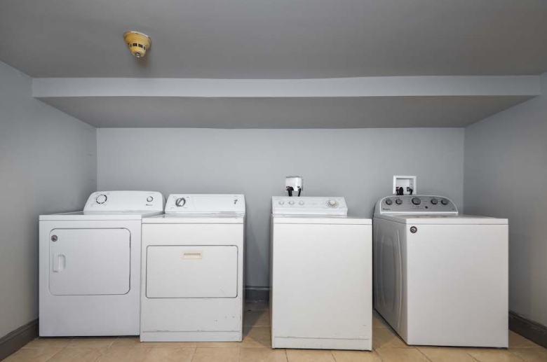 Laundry room with washer and dryer on site at 1316 Pine Street