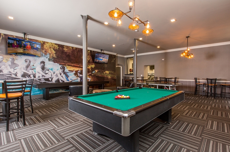 Strouse Adler billiard and shuffleboard space at social lounge