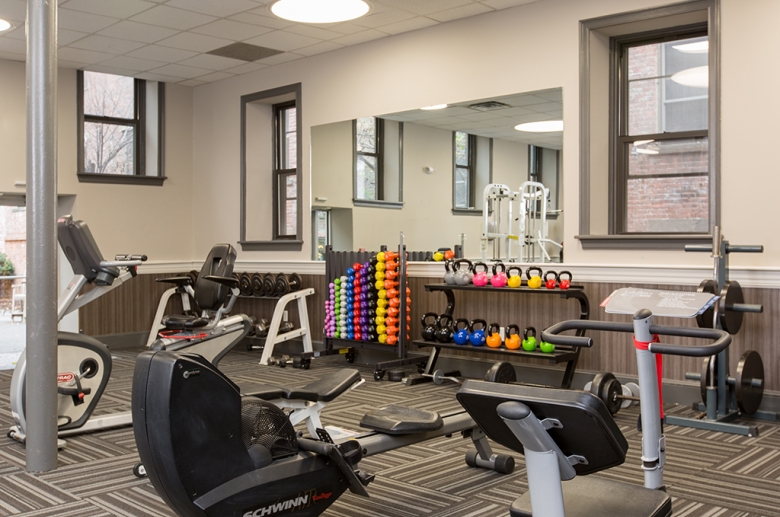 Strength training equipment at Strouse Adler gym