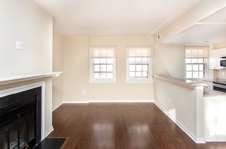 Gleaming hardwood floors and fireplace 