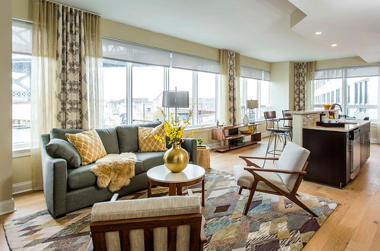 Open concept space with panoramic windows and stunning views of the city.