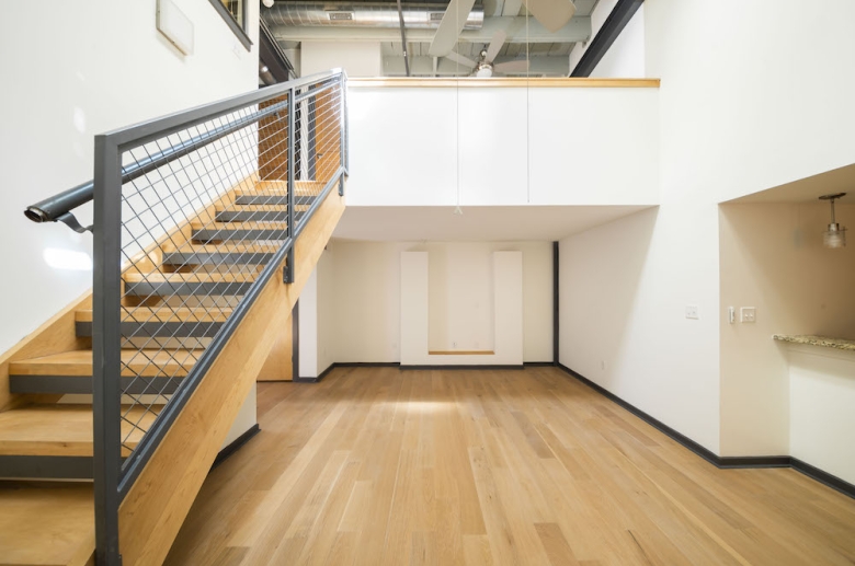 Living space with modern open staircase