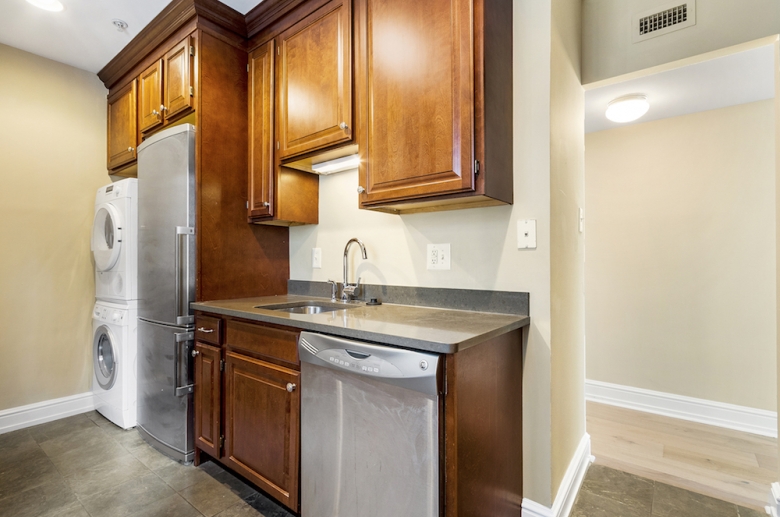 Some units with stackable washer and drying in kitchen space