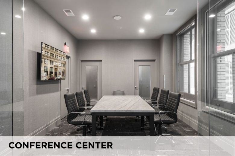 The conference center with study pods at Eight West Third Apartments