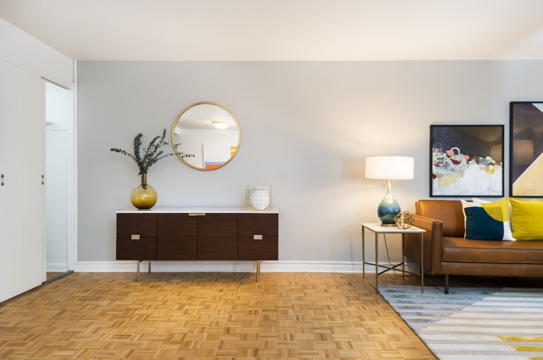 Open concept living space with hardwood flooring