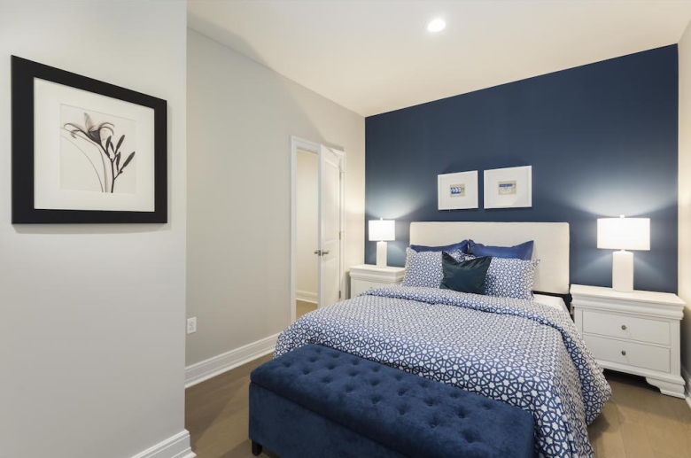 Bedroom with hardwood flooring