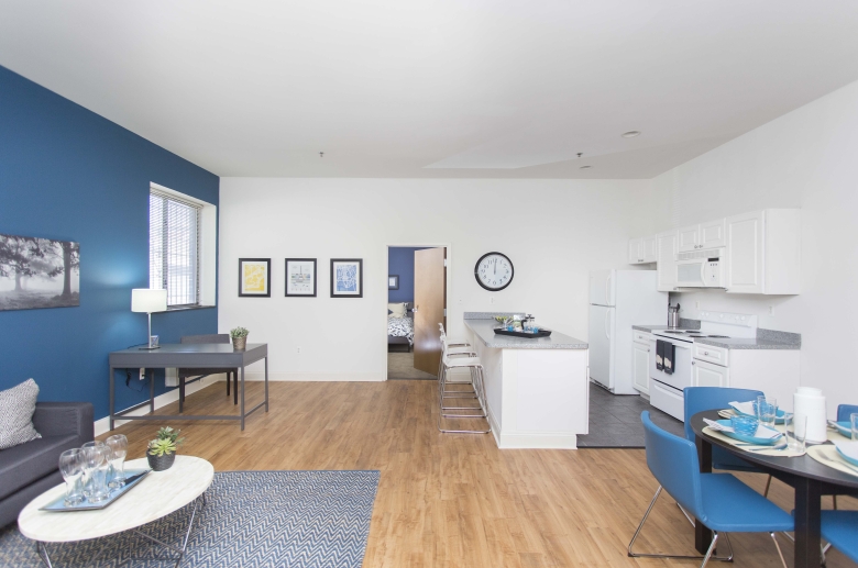 University Apartments open concept kitchen, living, and dining areas