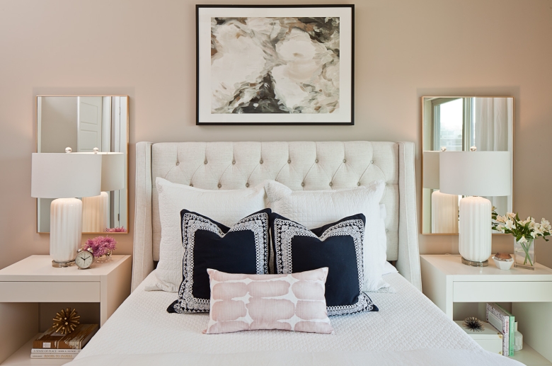 Bedroom with wall to wall carpeting