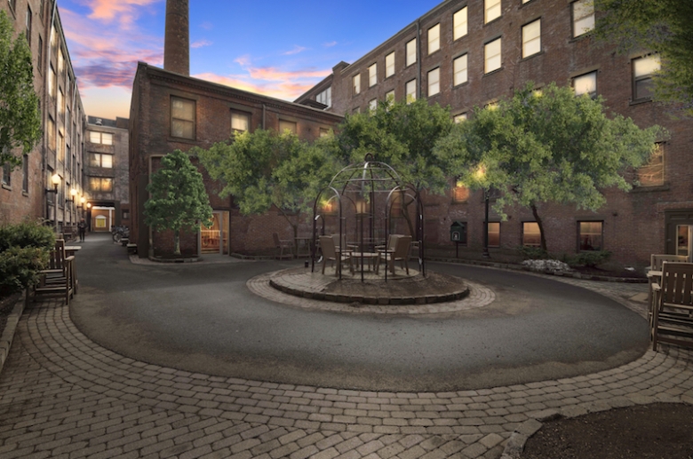 Center open courtyard with outdoor seating at Strouse Adler