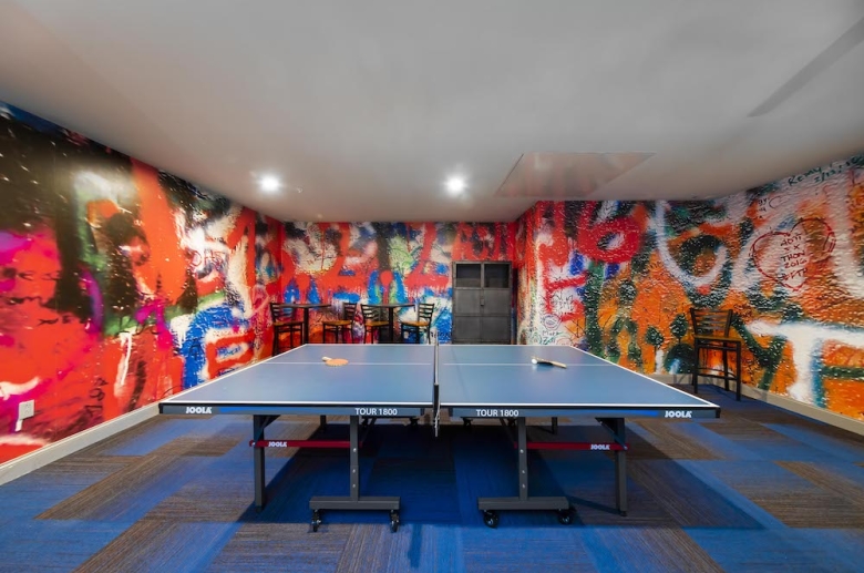 Resident lounge featuring table games, big screen TVs, and WiFi