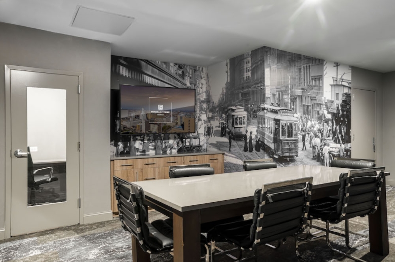 Business center with private and collaborative work spaces