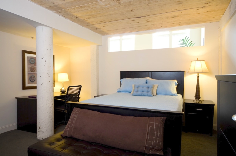 Original columns and wooden beam ceilings on Granby Mills beedrooms