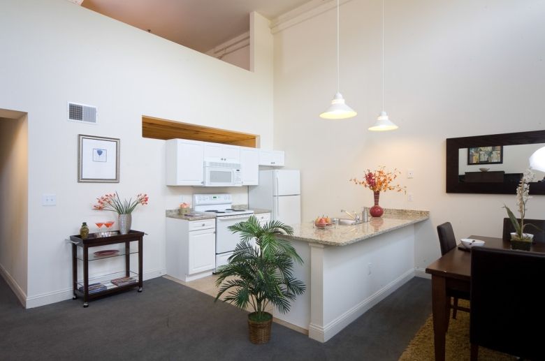 Granby Mills open-concept kitchen featuring granite countertops