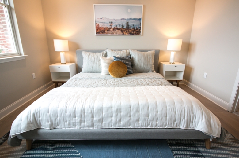 Room with king-sized bed at The Cottages at The Mills 