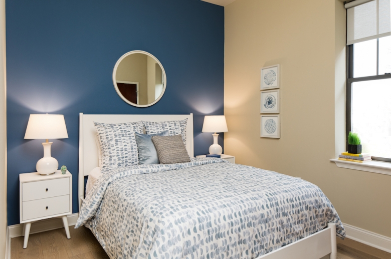 Bedroom with hardwood flooring