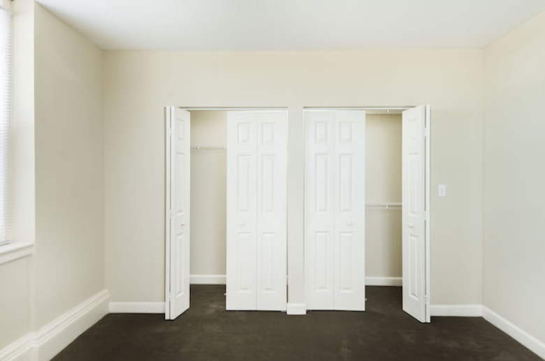 Bedroom with dual closets