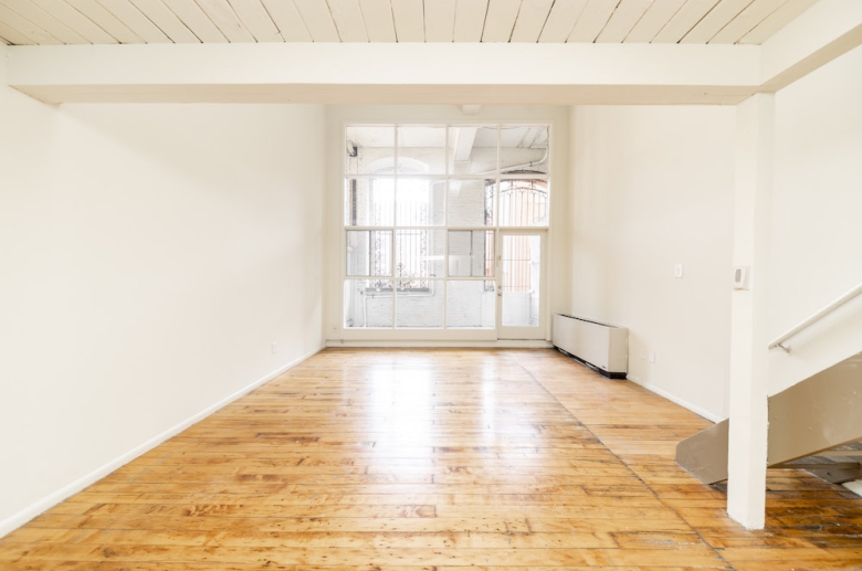 Living space with floor to ceiling windows