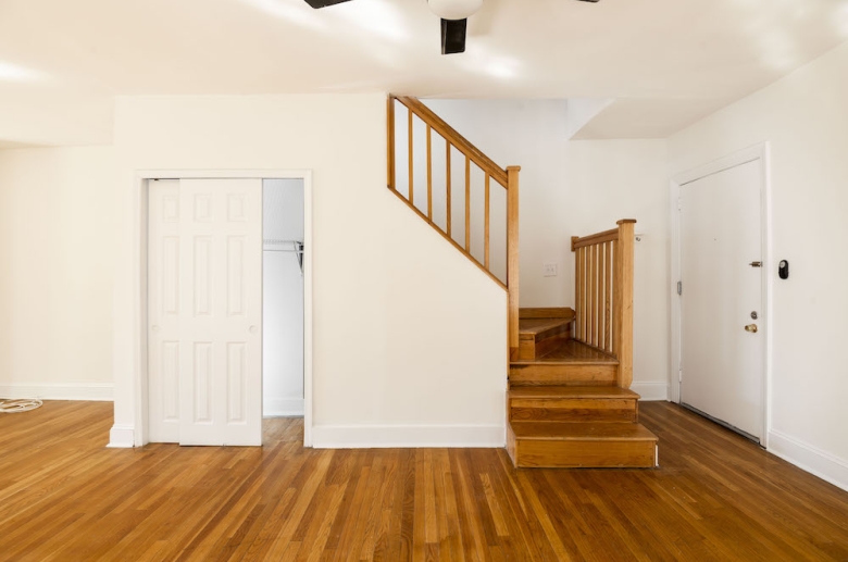 Common areas featuring gleaming hardwood floors