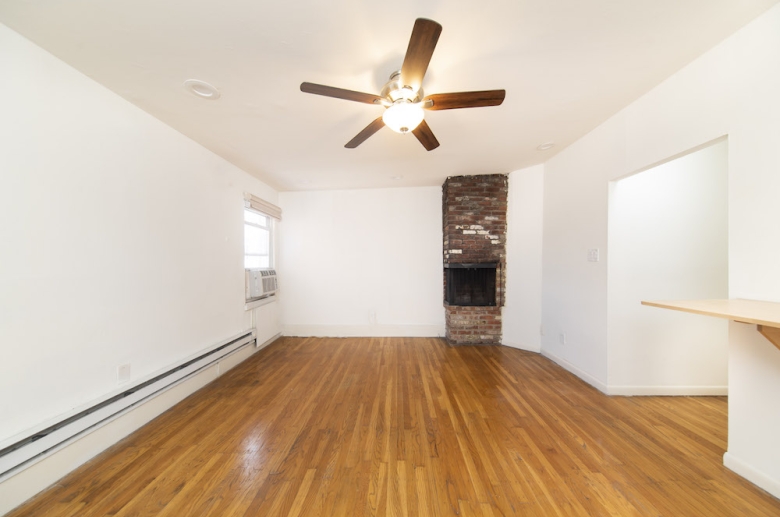 415-417 S. 10th Street exposed brick wall fireplace