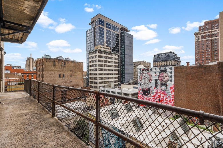 Shared balcony view of the city