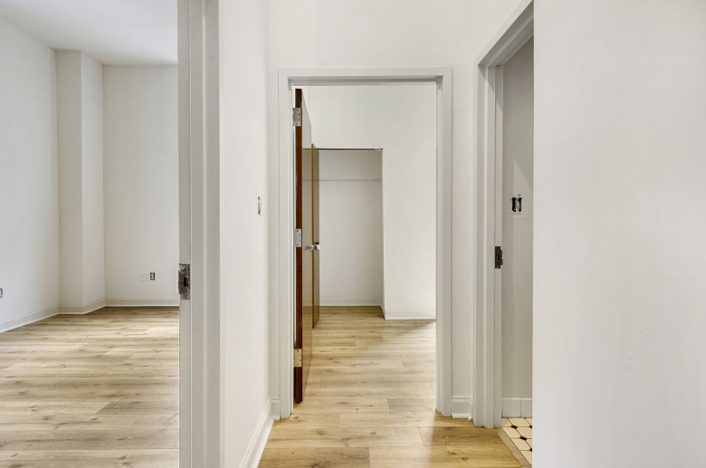 A different view of the floorplan showing living, bedroom and bathroom entrance