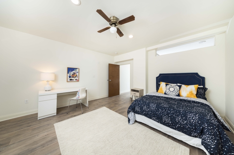 Model bedroom with ceiling fan