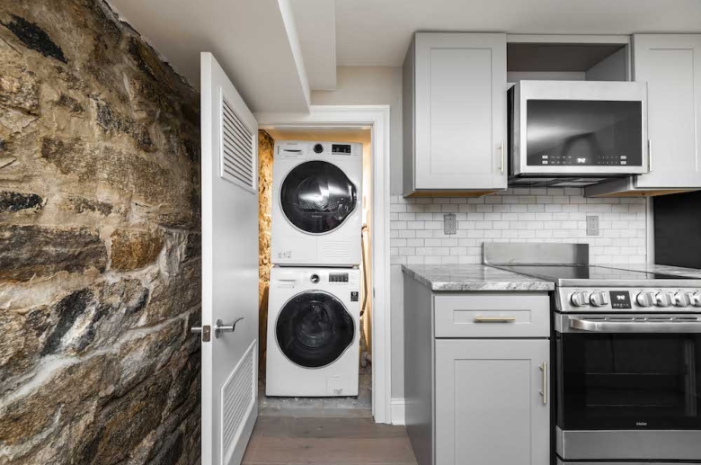 Stackable washer and dryer unit