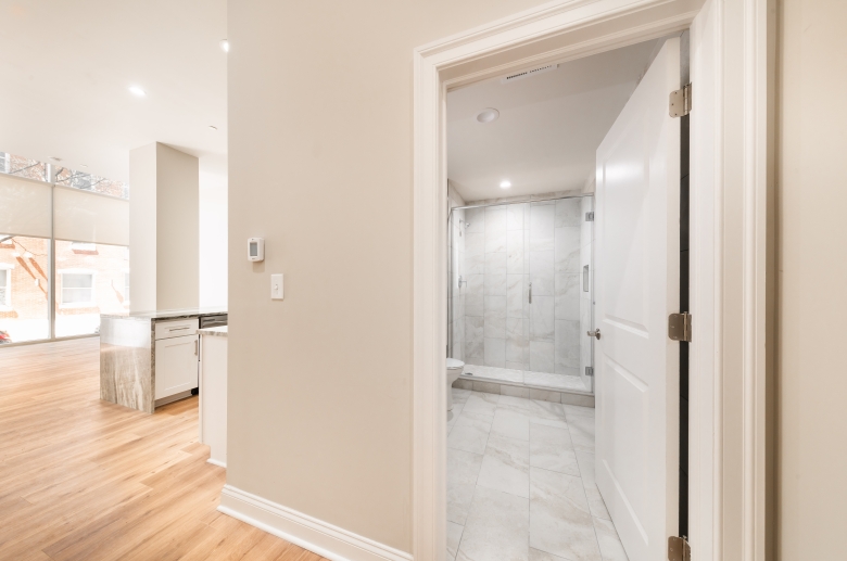 Kitchen, living, and bathroom spaces at 2040 Market Street