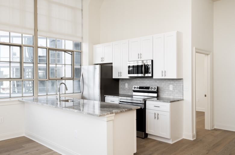 Open concept kitchen with modern appliances 