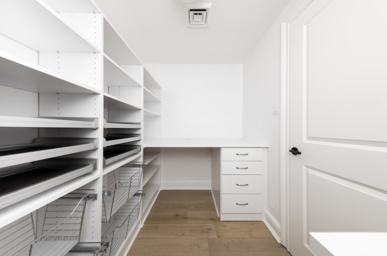 Penthouse walk-in closet with organizer 