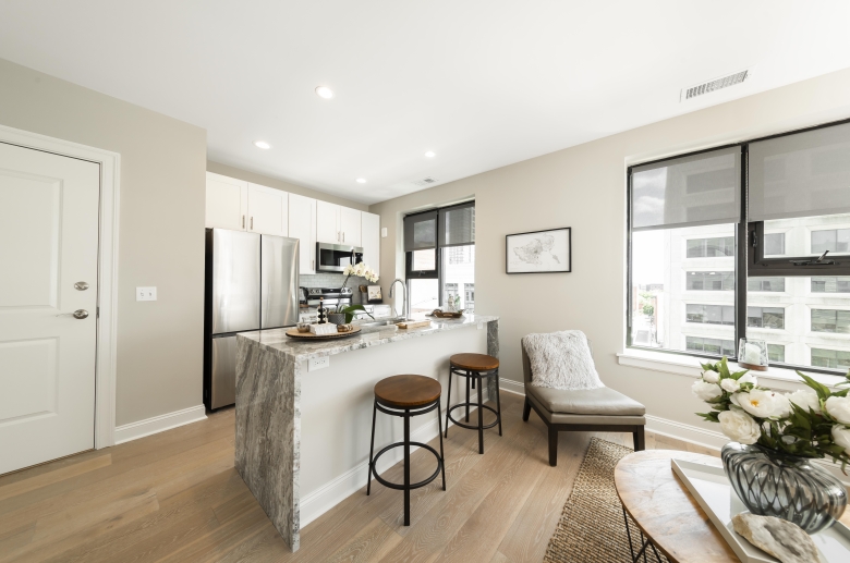 Kitchen and dining area with city views