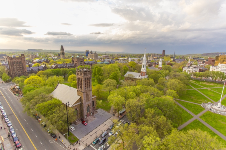 A panoramic view of the outside from a window at Residence on the Green