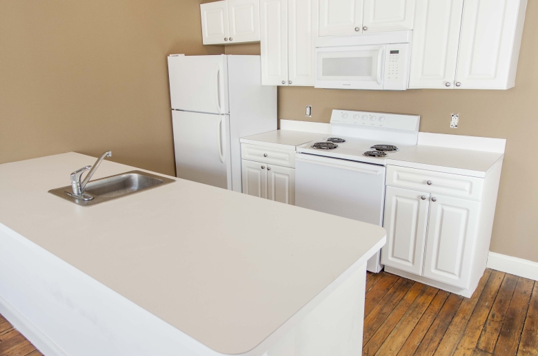 Kitchen island with stainless steel sink