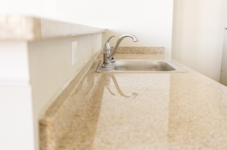 Breakfast bar with granite countertop