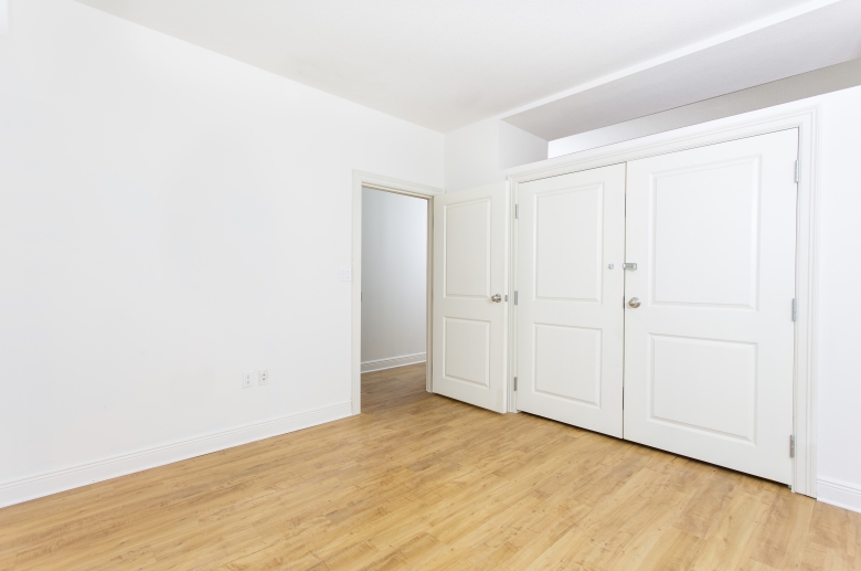 Bedroom with ample closet space