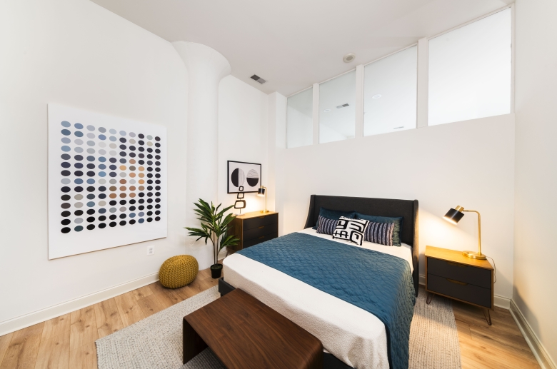 Furnished bedroom at Warehouse Apartments