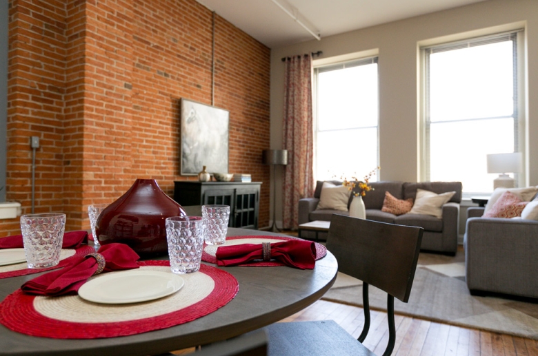 Dining space with exposed brick wall