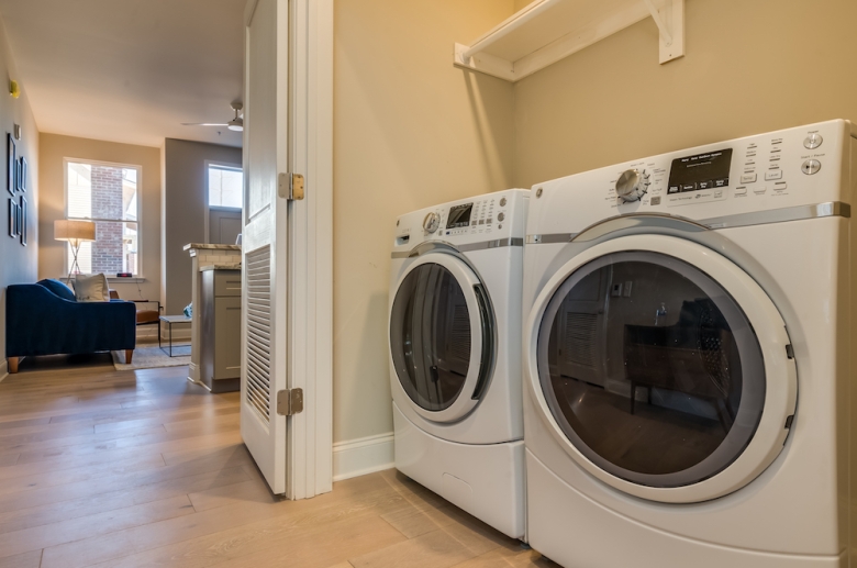 Laundry room with washer and dryer unit