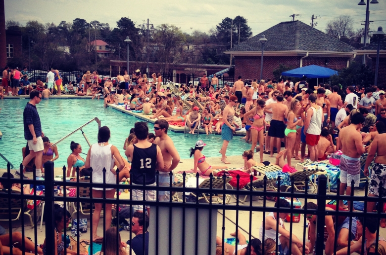 Residents gather around the pool