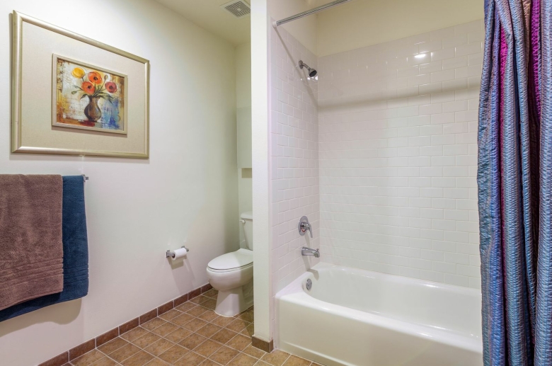 The Atrium model unit bathroom with ceramic tile