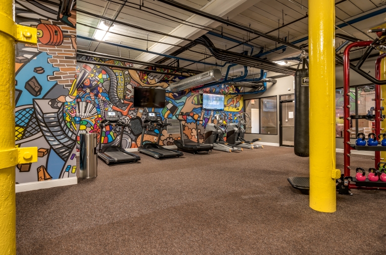 An array of cardio equipment in The Mills gym