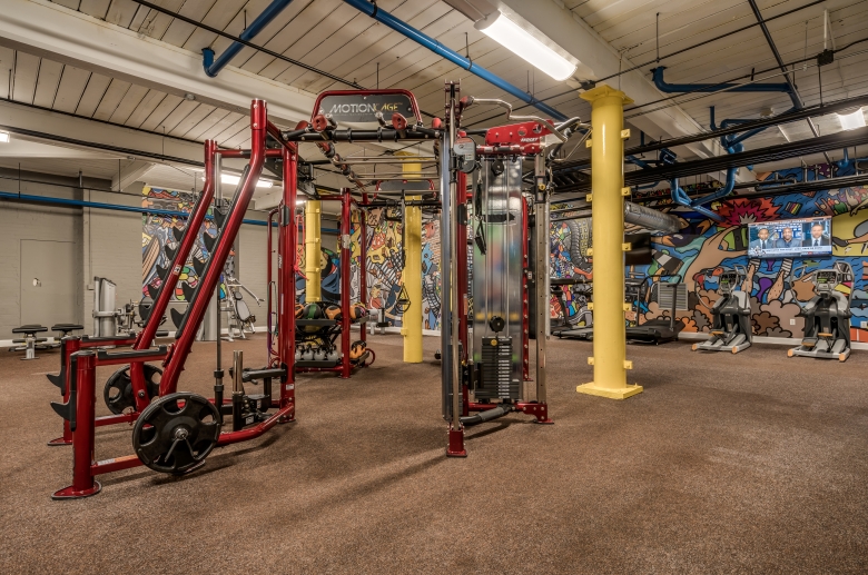 A variety of strength-training equipment at The Mills fitness center