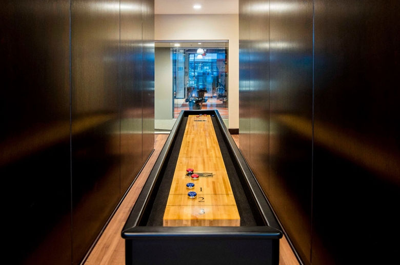 Resident lounge featuring table games, such as shuffleboard