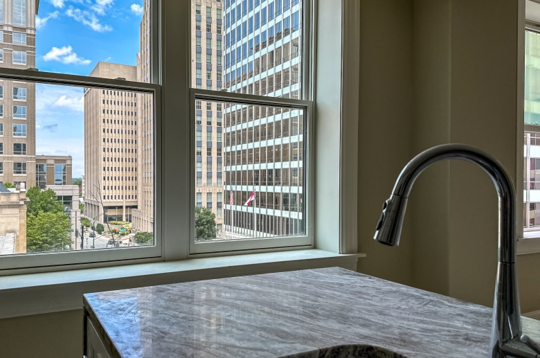 Granite counter with window overlooking the city