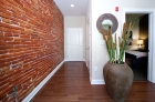 1201 N Charles unit entry with exposed brick