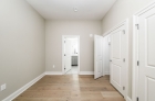 Bedroom with hardwood flooring