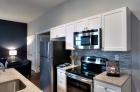 An open-concept kitchen at The Residences at The R. J. Reynolds Building